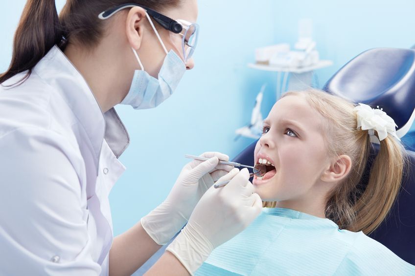 How Pediatric Dentists in Wheaton Diagnose Causes of Bleeding Gums